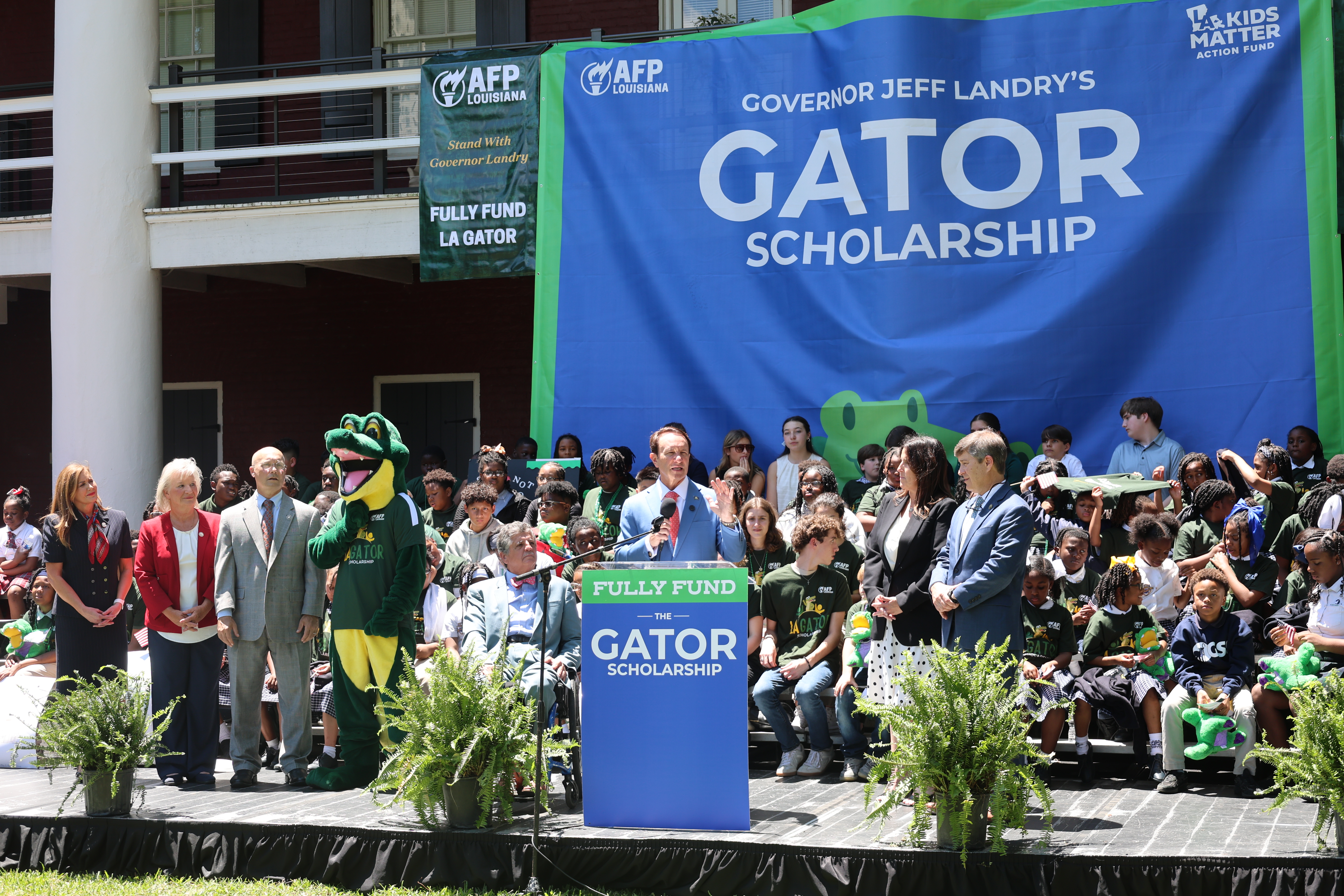Governor Jeff Landry speaking at Gator Scholarship event